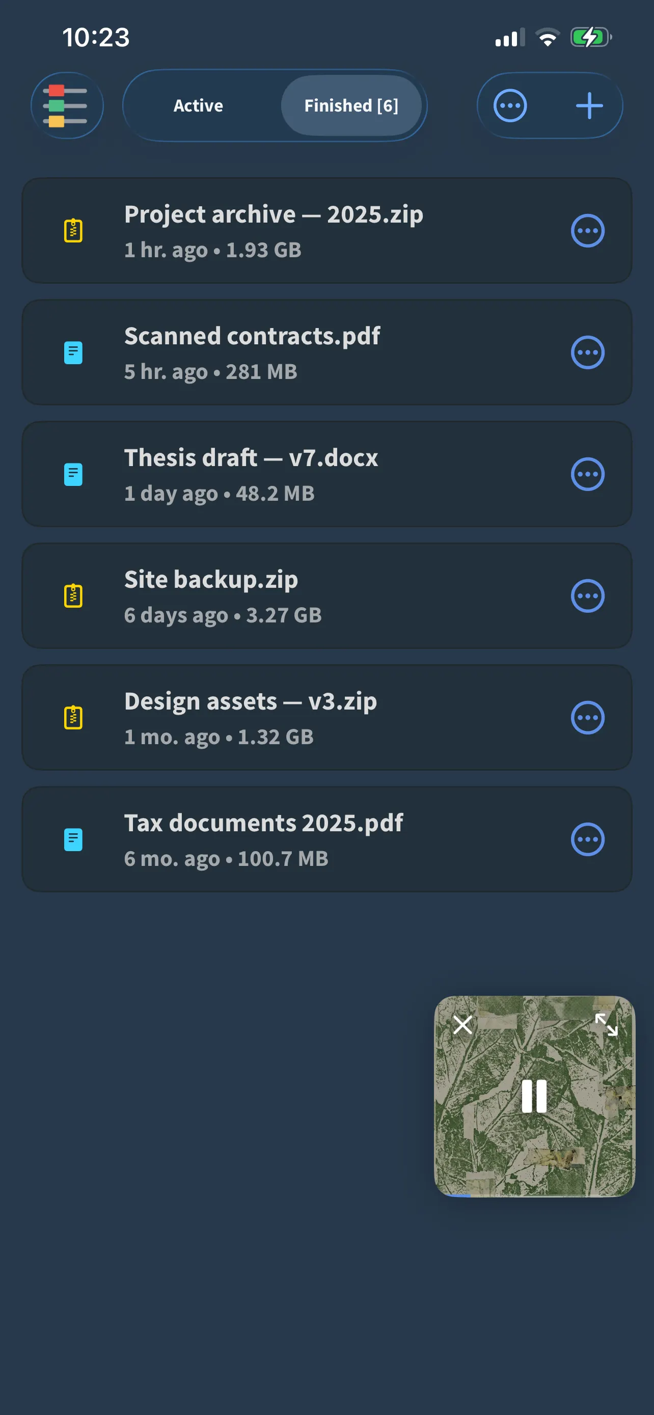 FoxFM’s downloads list showing finished files with their sizes and when they arrived