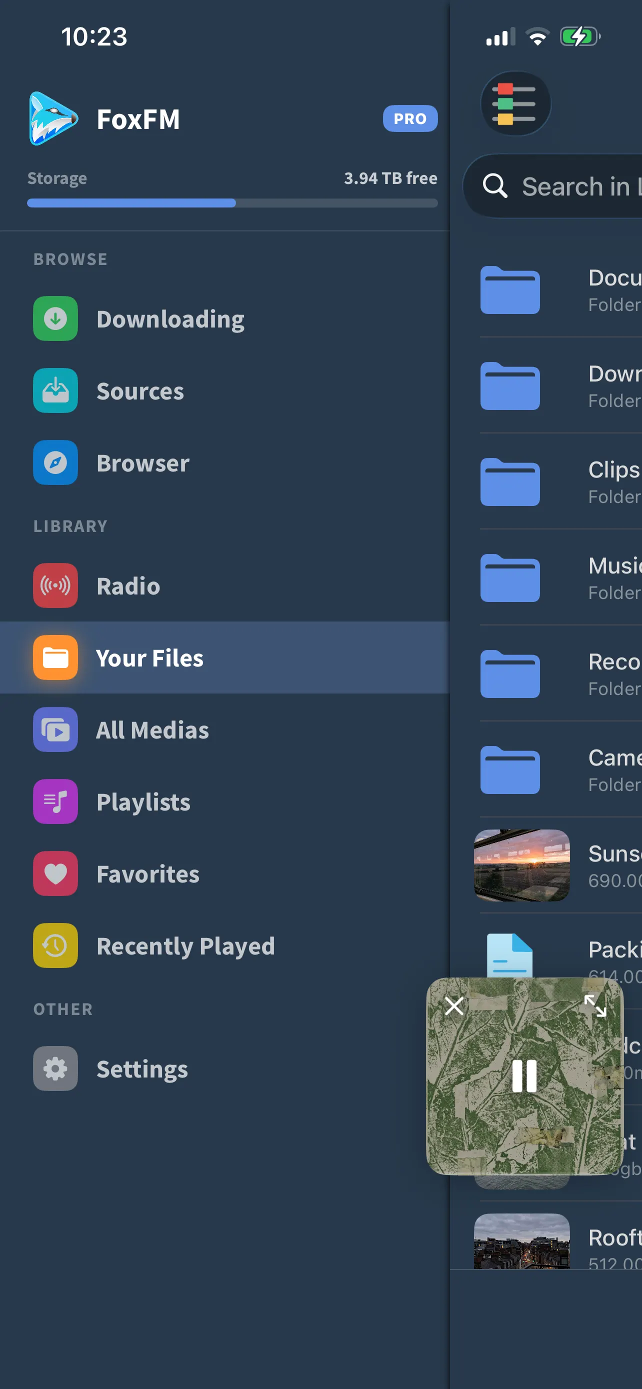 FoxFM’s menu with Downloading, Sources, Browser, Radio, Your Files, All Medias, Playlists and Favorites