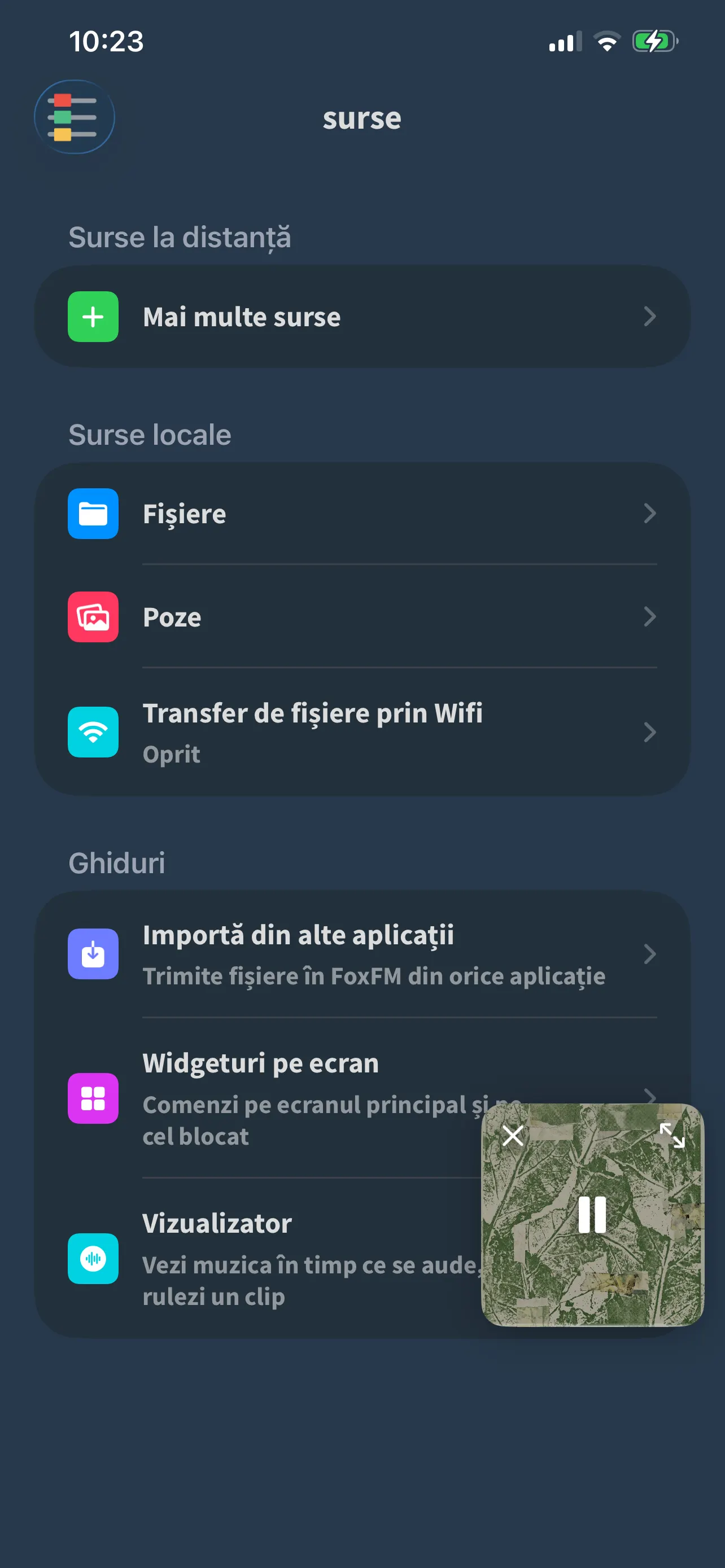 Ecranul Surse din FoxFM: Fișiere, Poze și Transfer de fișiere prin Wifi, iar dedesubt secțiunea Ghiduri
