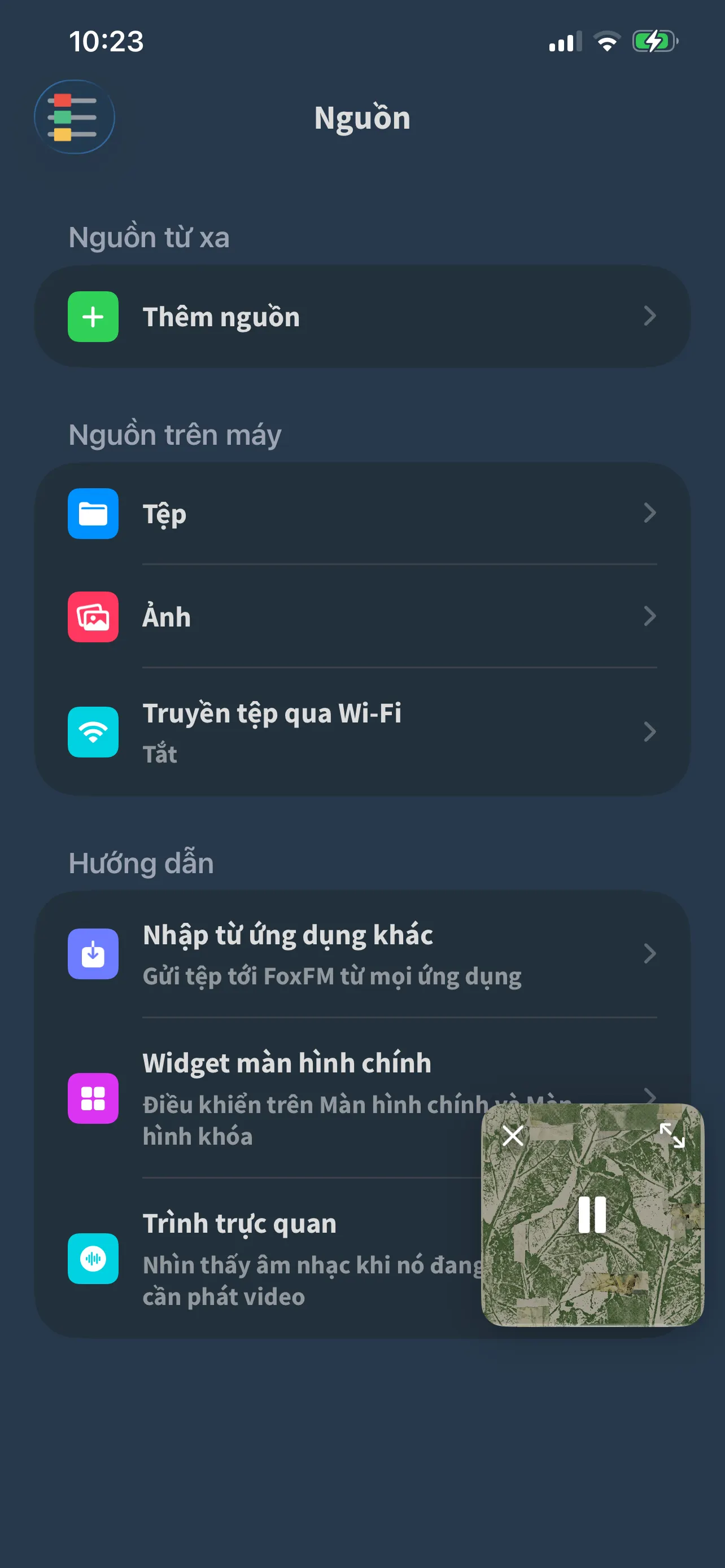 Màn hình Nguồn của FoxFM: Tệp, Ảnh và Truyền tệp qua Wi-Fi, bên dưới là mục Hướng dẫn